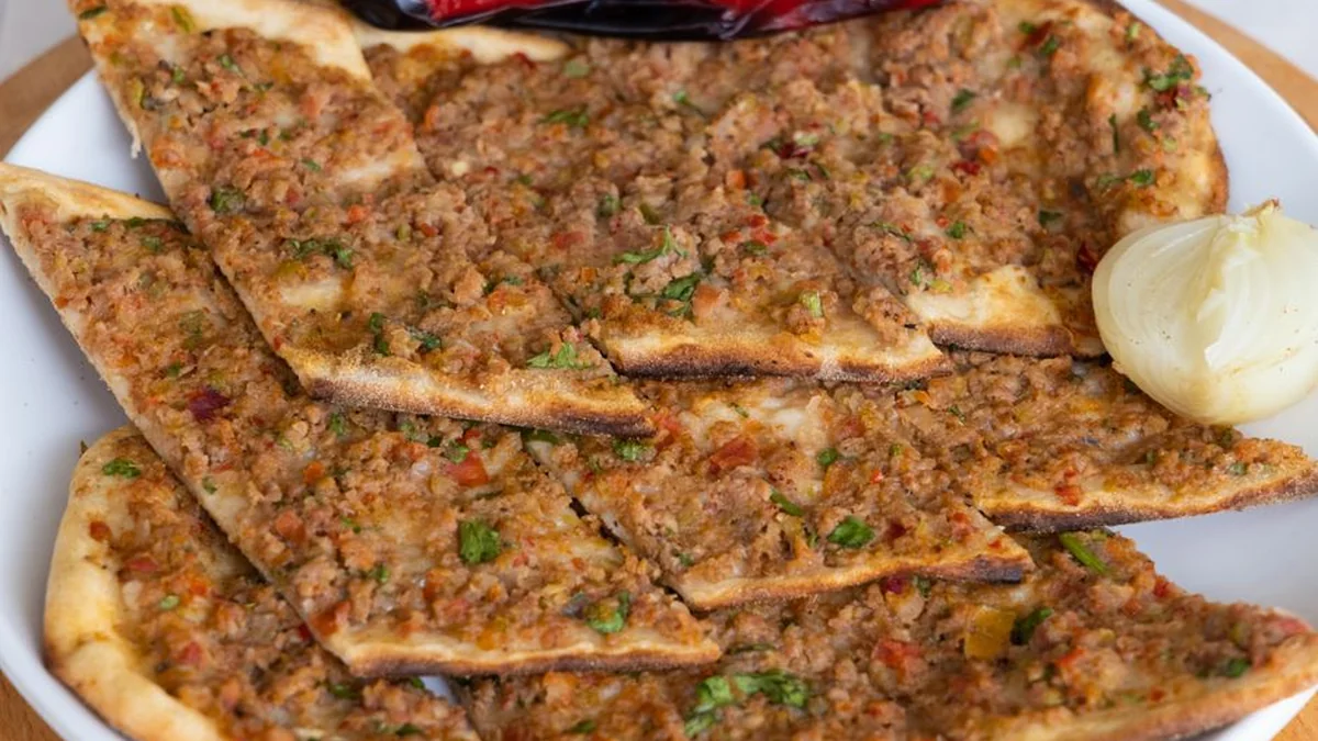 Turkish pizza with meat, vegetables, and cheese: A soft, rich, and very delicious recipe