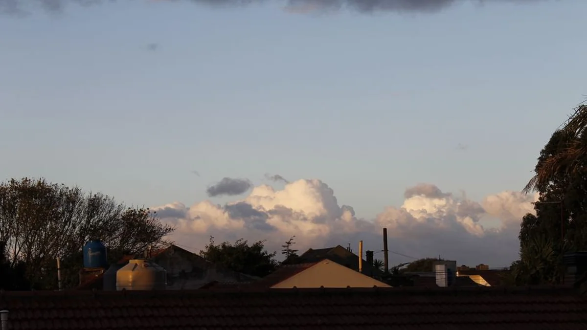 Sunny and partly cloudy with showers in some areas